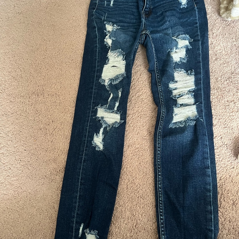 Distressed Blue Jeans